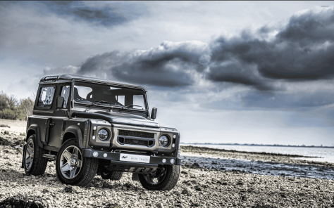 Custom Defender on rocky shore