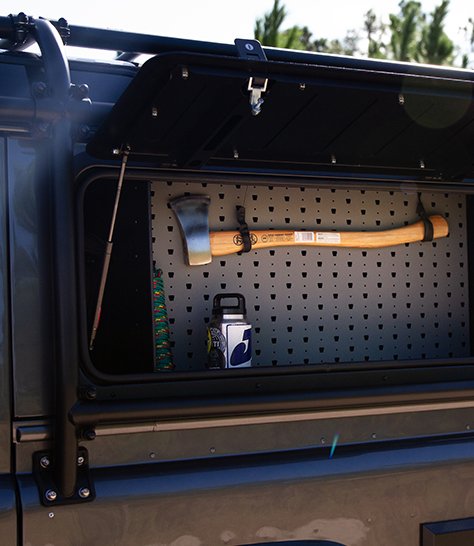 custom defender storage with axe
