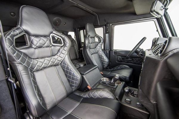 Custom Defender 130 Interior with black leather seating