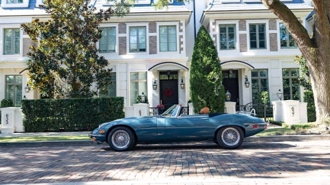 Classic Jaguar E-Type History in front of townhomes in Winter Park, FL